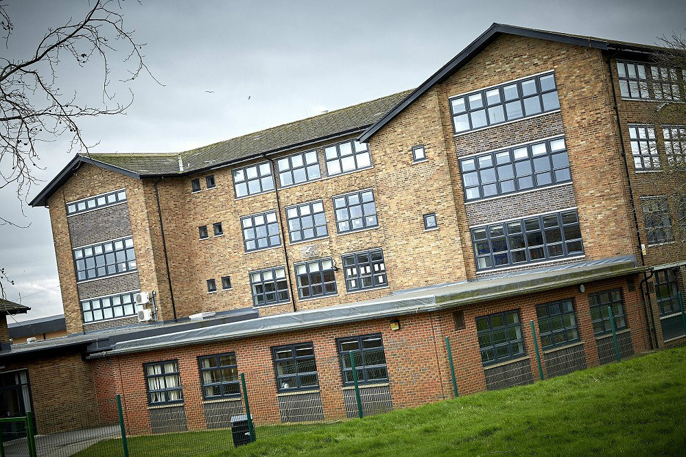 Anthracite grey UPVC windows on a refurbished school building