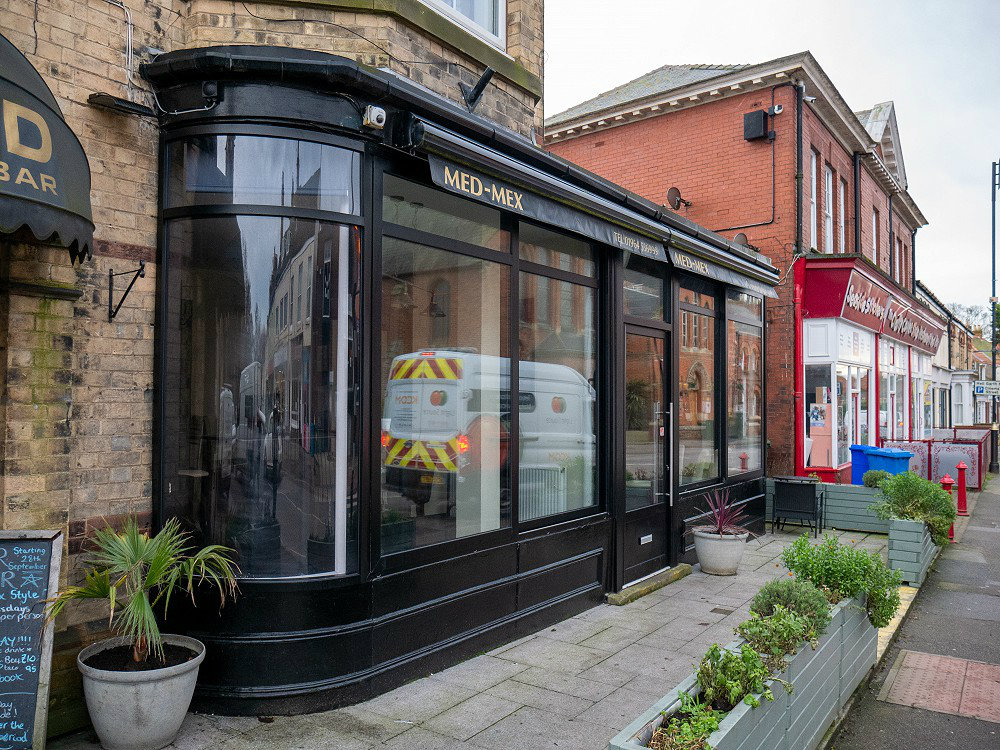 Aluminium windows and doors installed on shop front