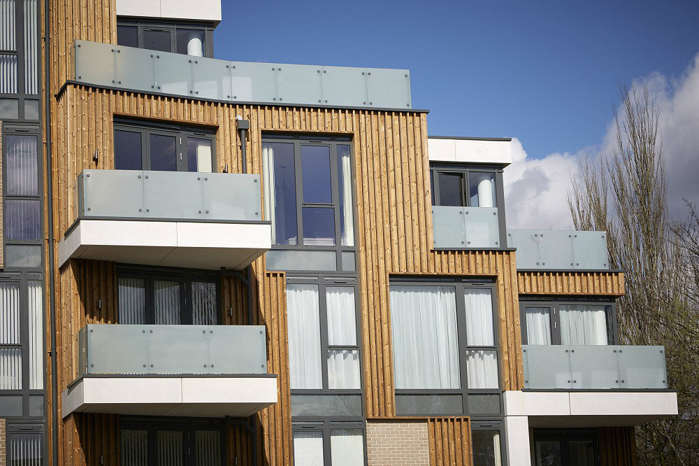 Curtain walling screen and aluminium windows and doors on apartment block