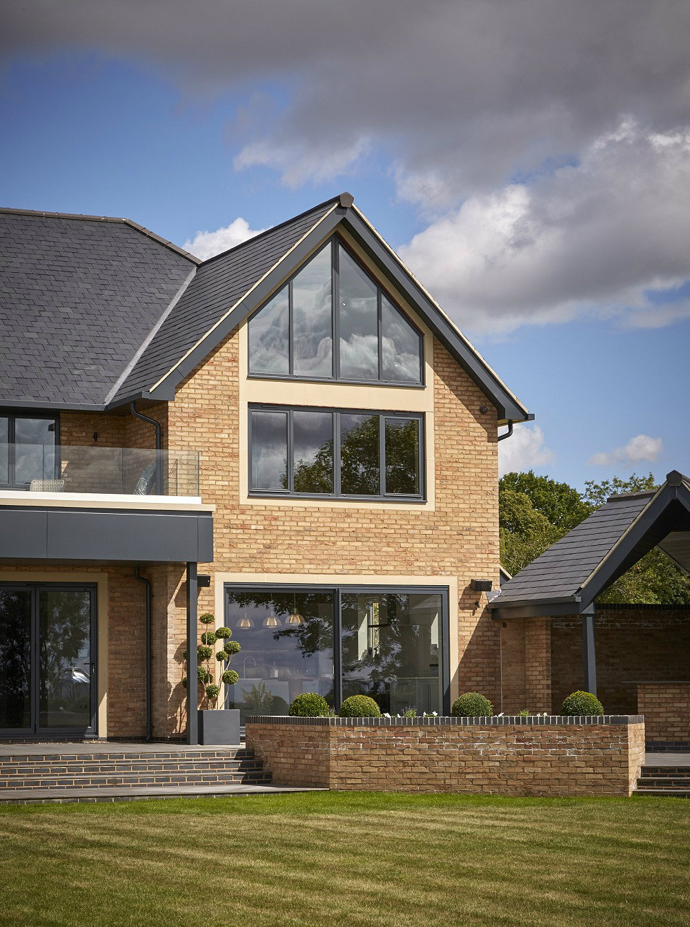 Aluminium windows and bifold doors on large new house